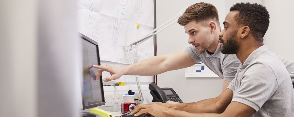 One Image Workers at Desk