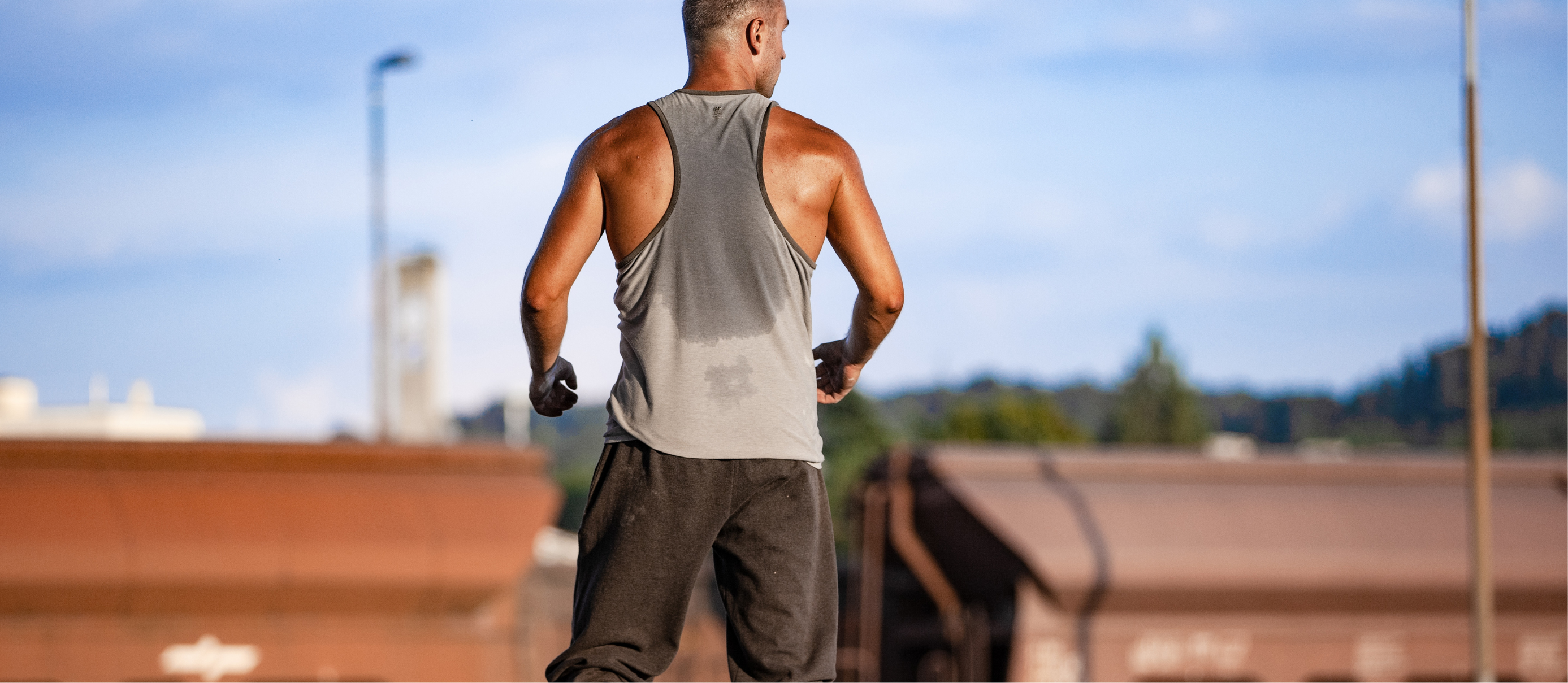 grey tank sweating