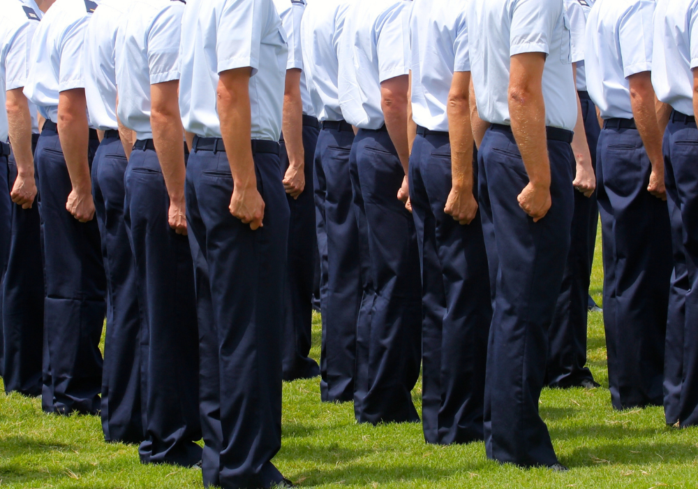 soldiers in blue uniforms stood in rows