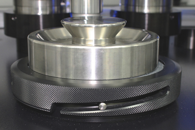 Close-up of Martindale quick change sample bed clamps