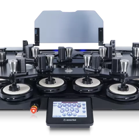 Martindale Motion abrasion and pilling tester with motorised test head lift by James Heal
