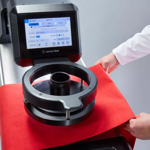 James Heal - AirPro air permeability tester - close up red test fabric
