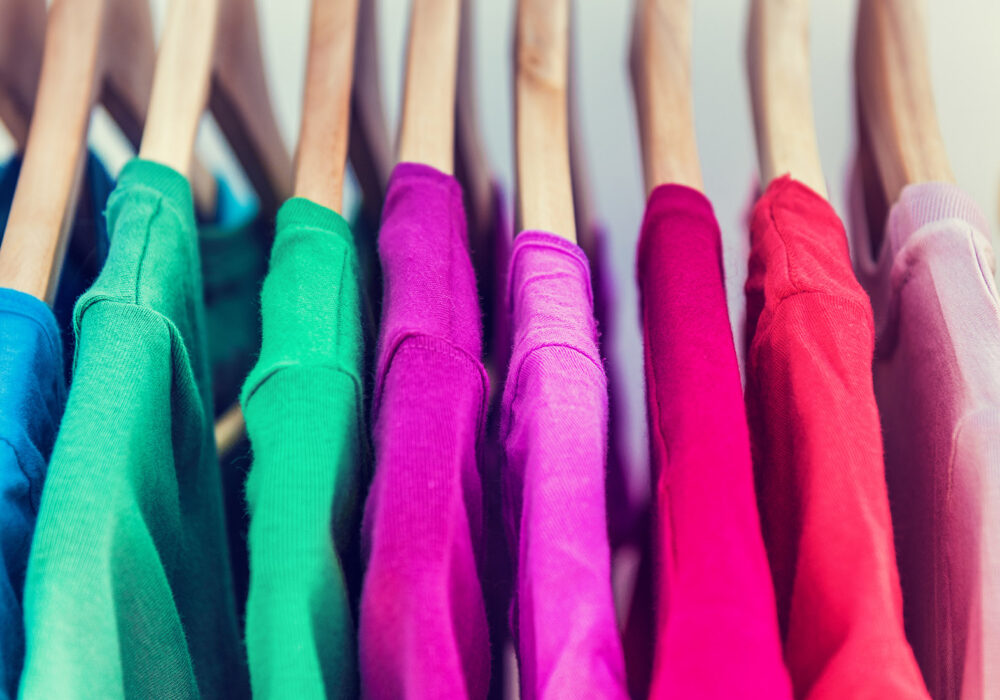 multi coloured tshirts on hangers